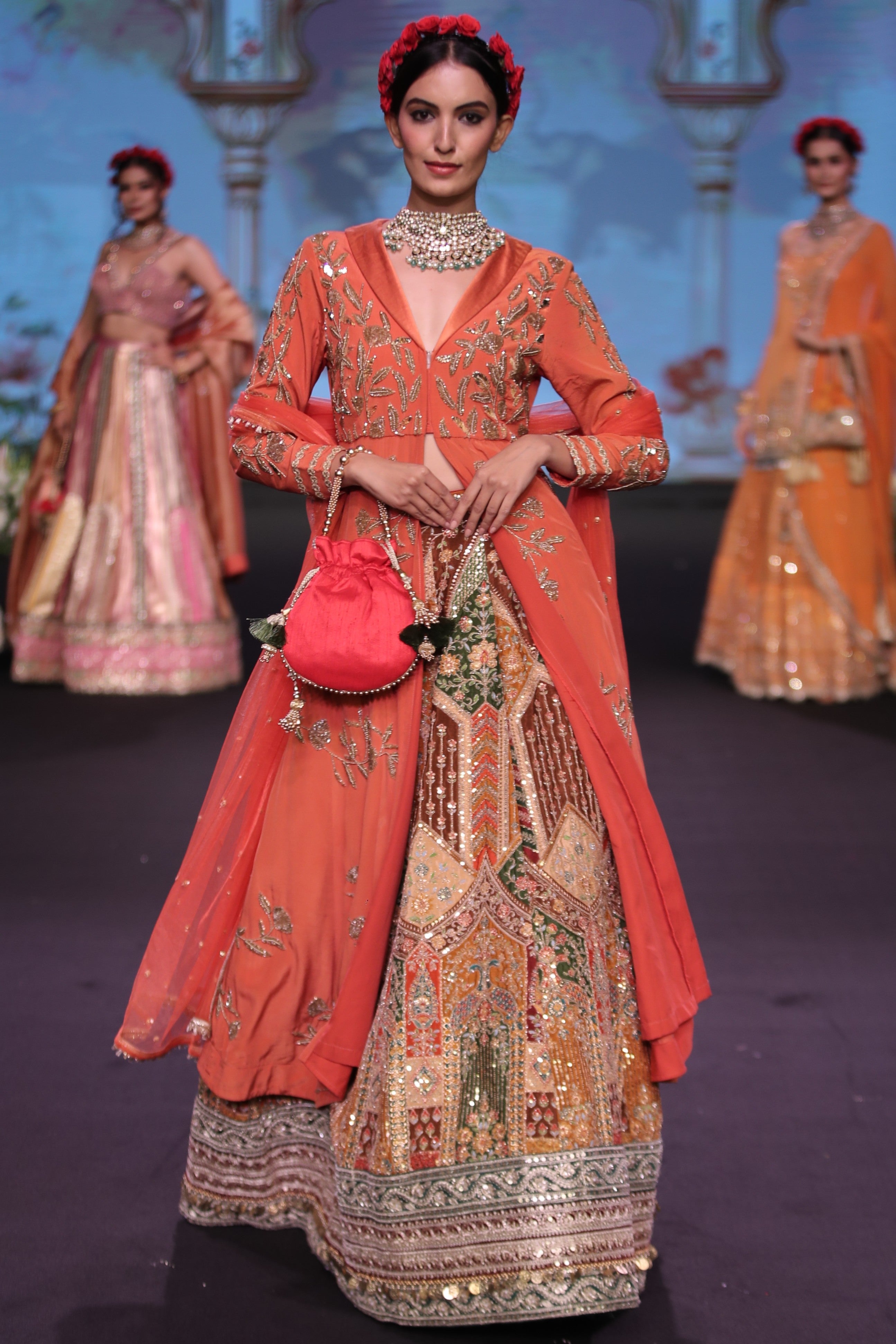 Orange kurta jacket and multi color embroidered lehenga set