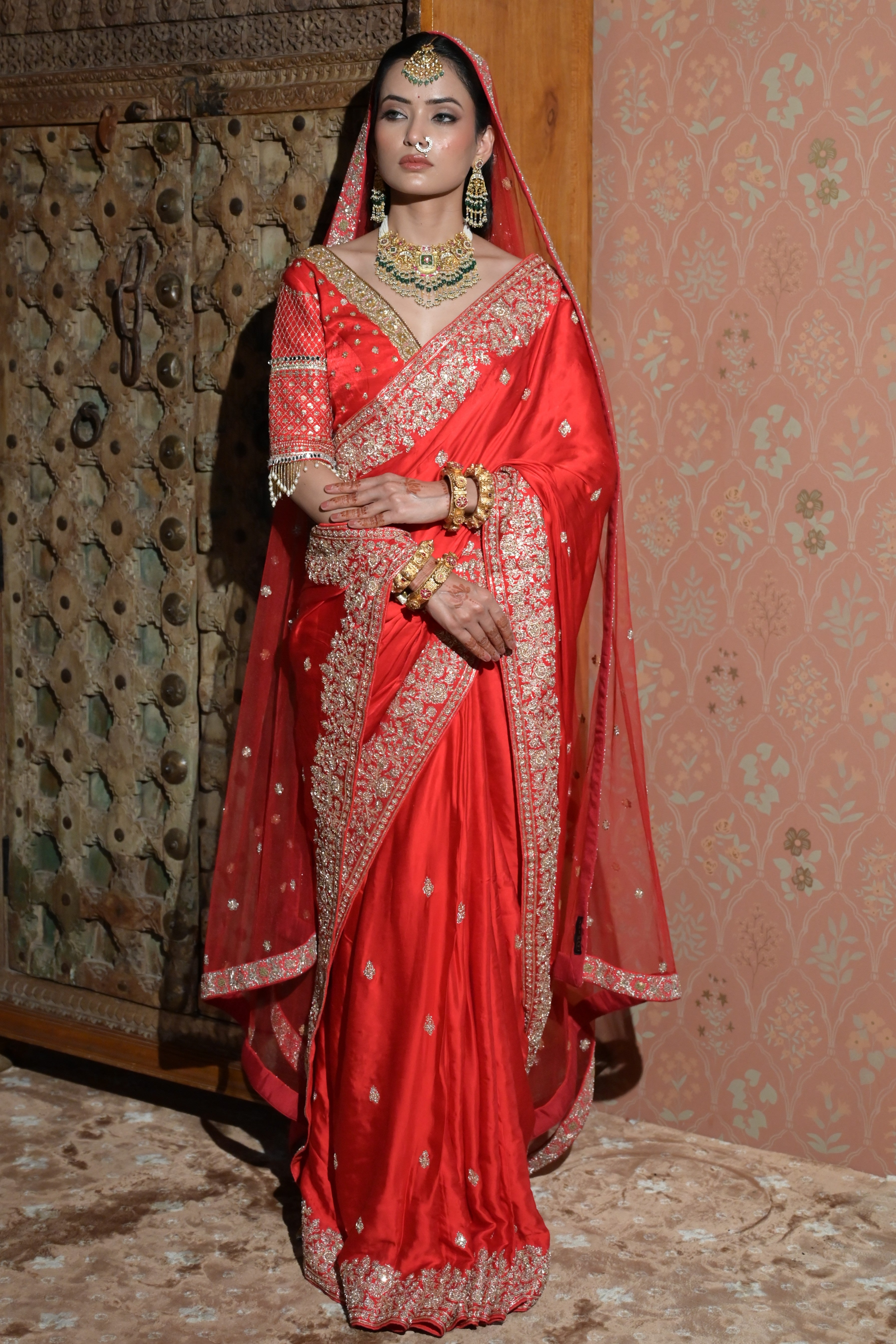 Red embroidered saree