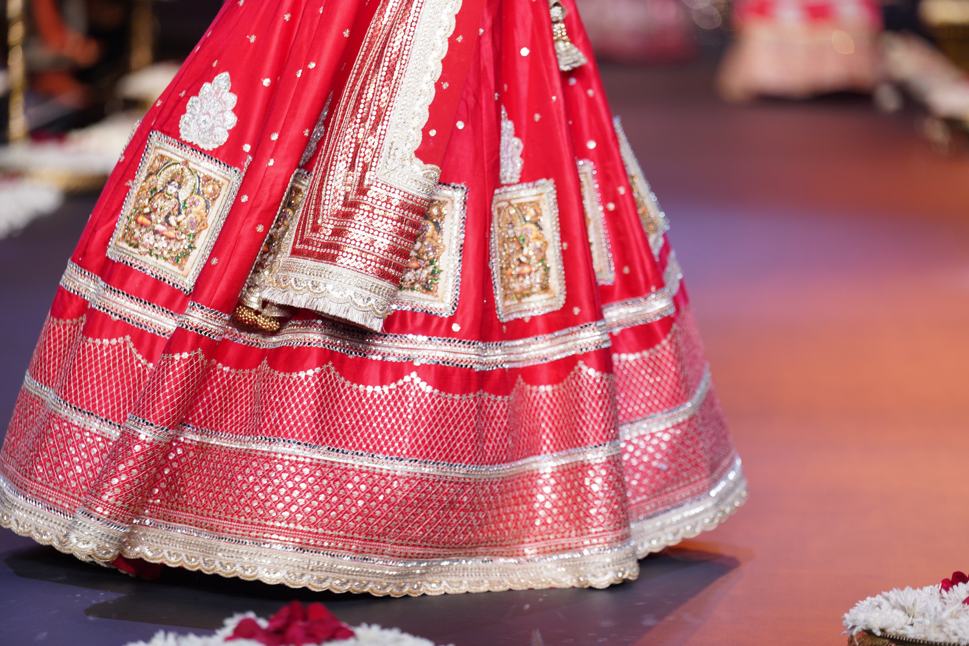 Red embroidered and applique work lehenga set
