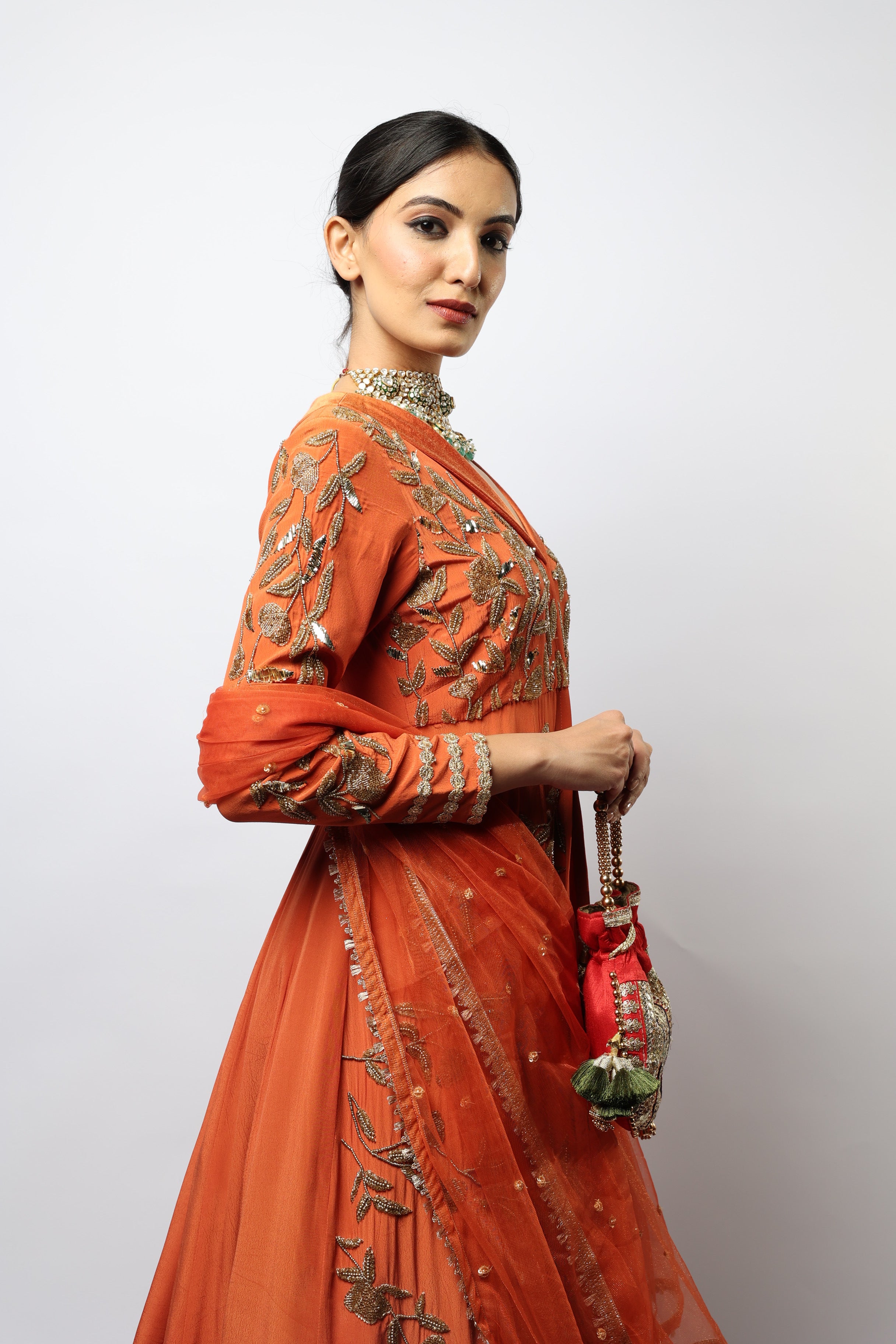 Orange kurta jacket and multi color embroidered lehenga set