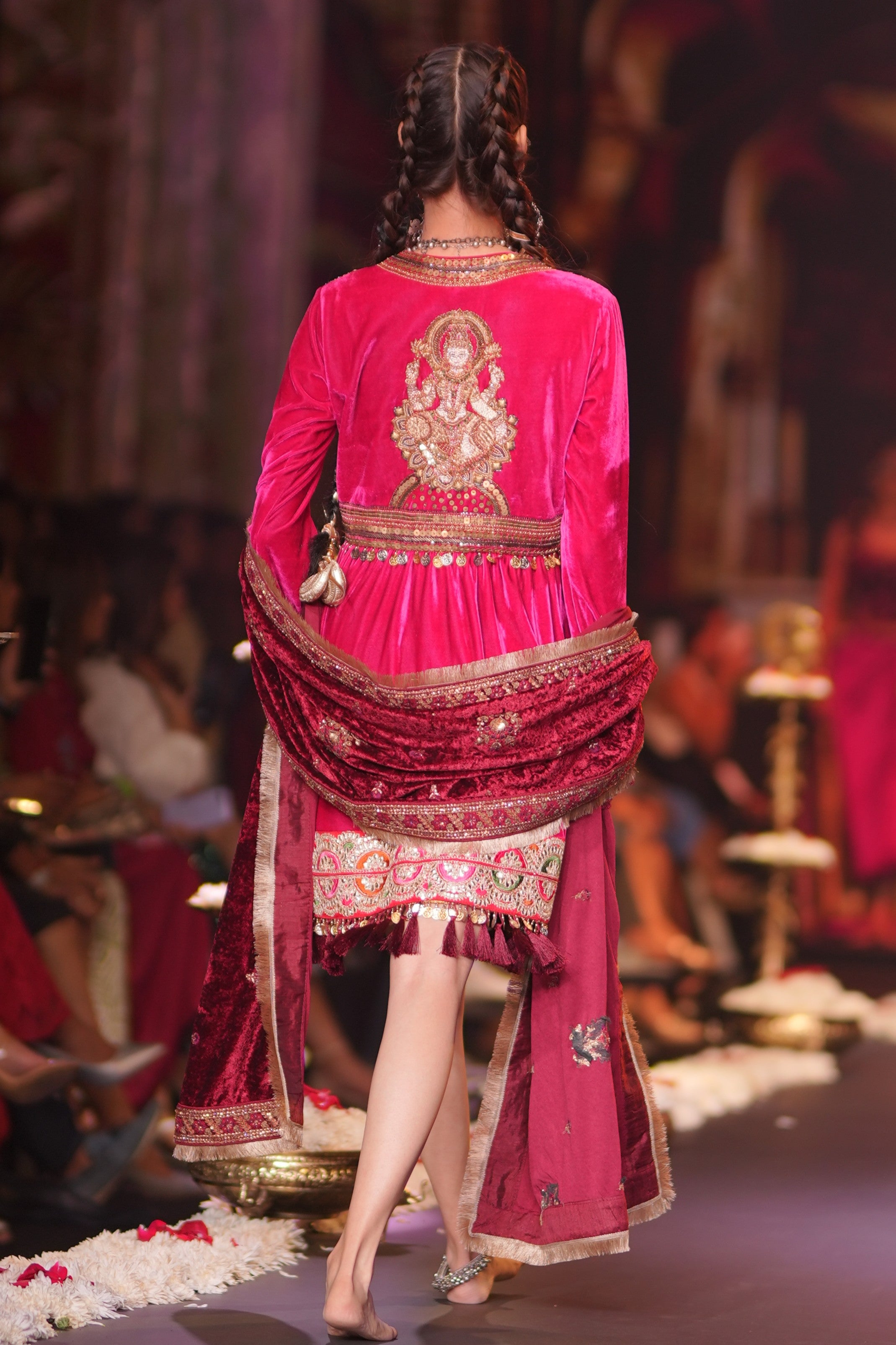 Red dress with laxmiji embroidery at back