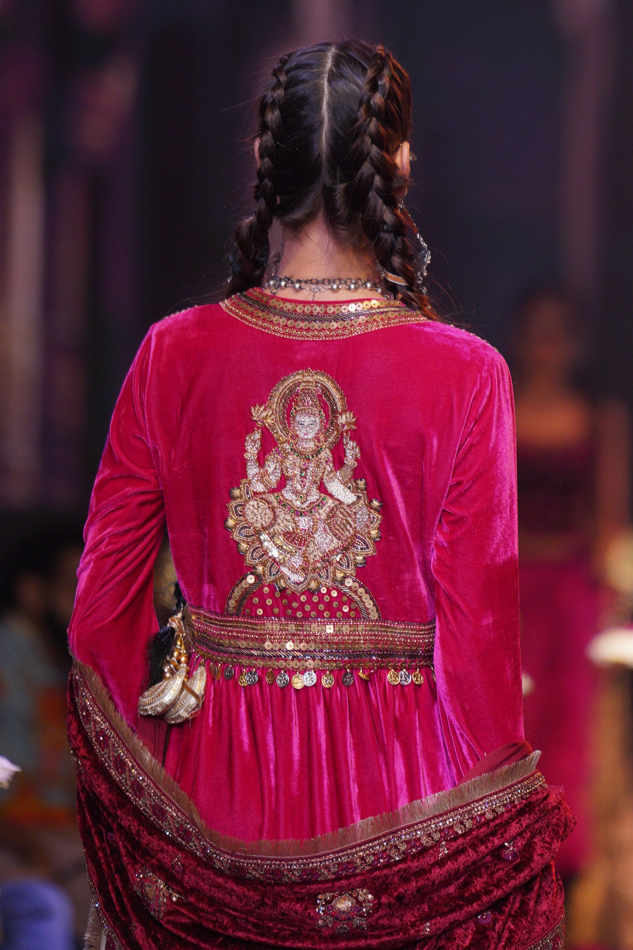 Red dress with laxmiji embroidery at back