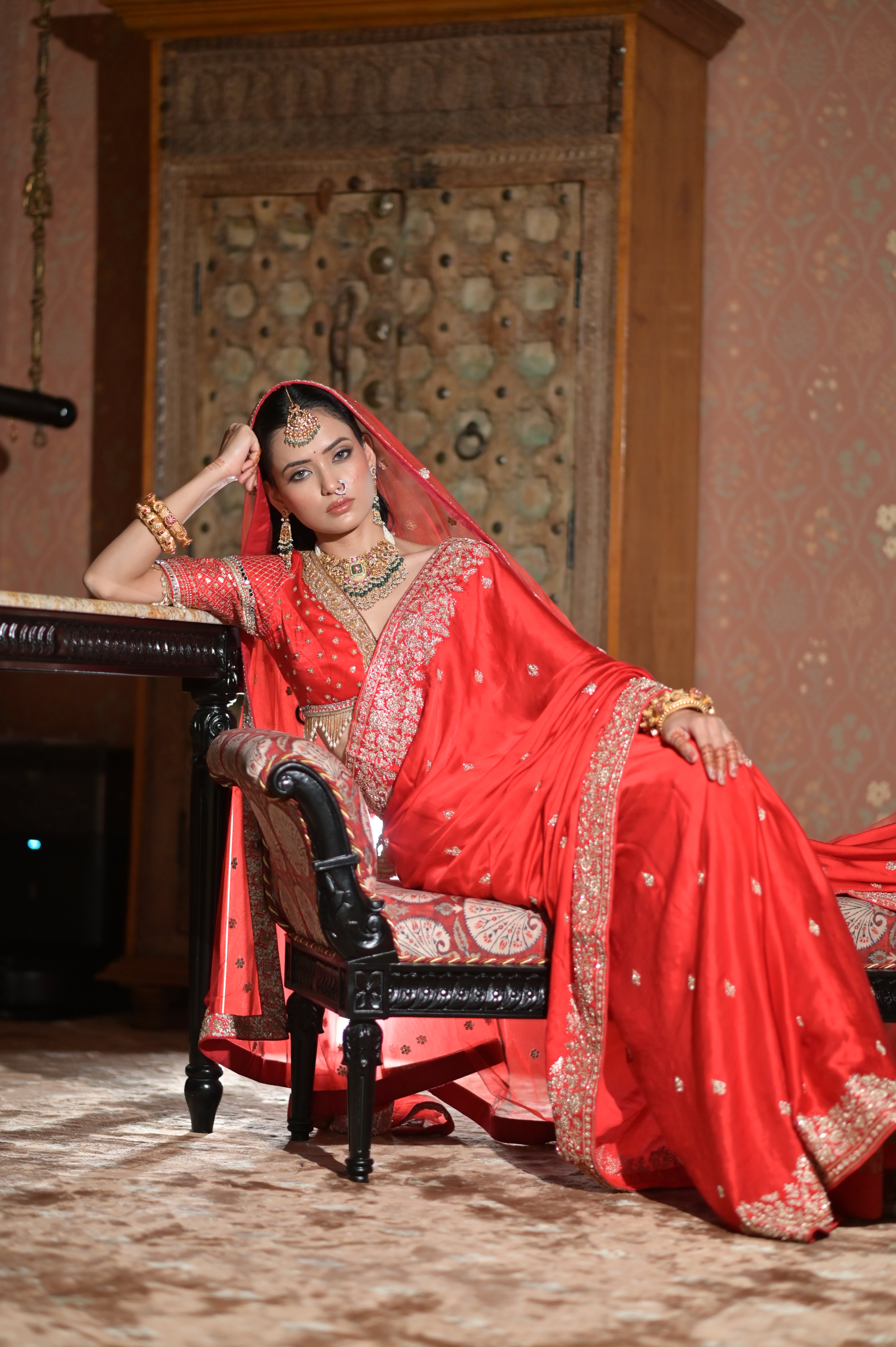 Red embroidered saree