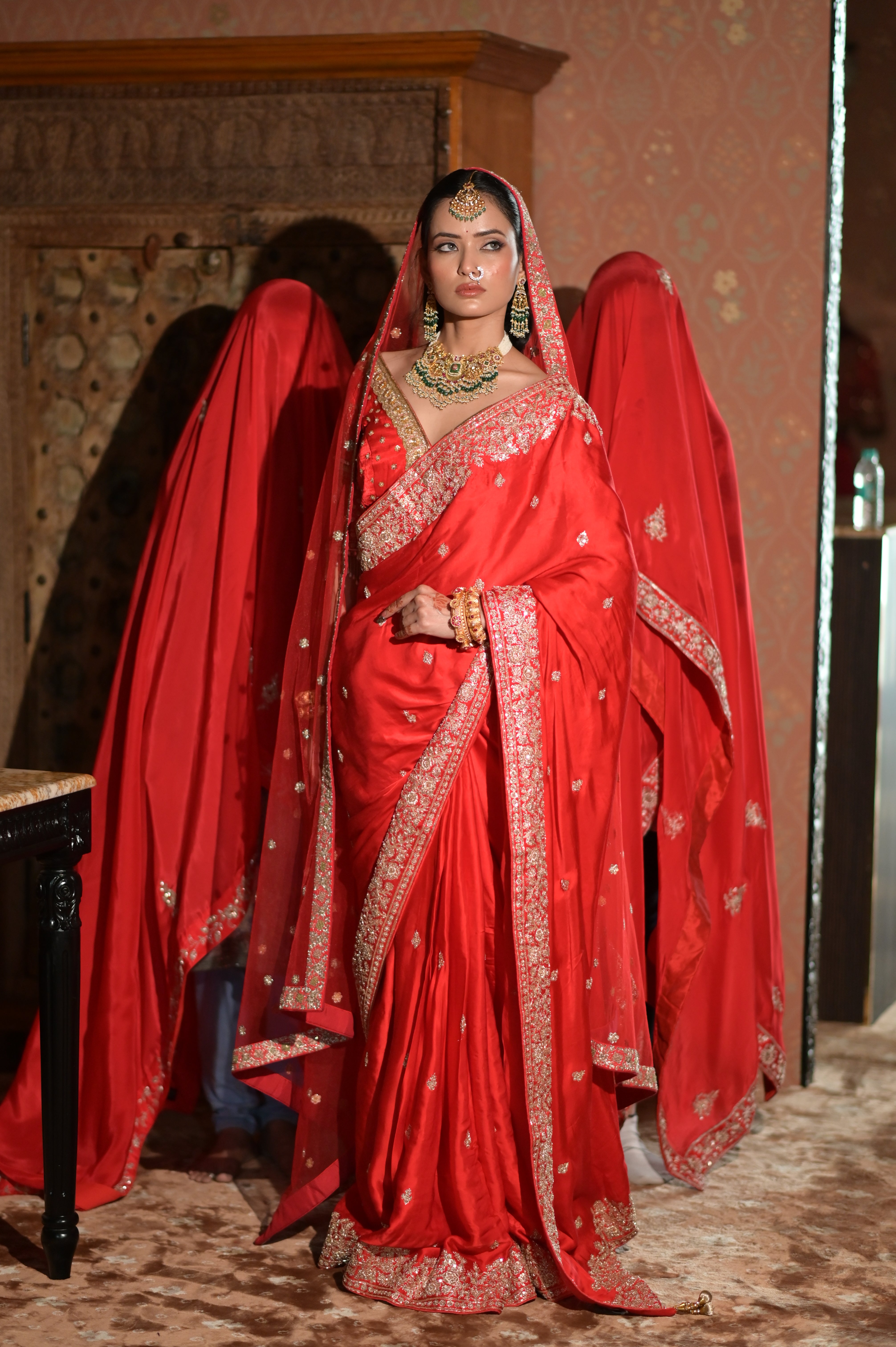 Red embroidered saree