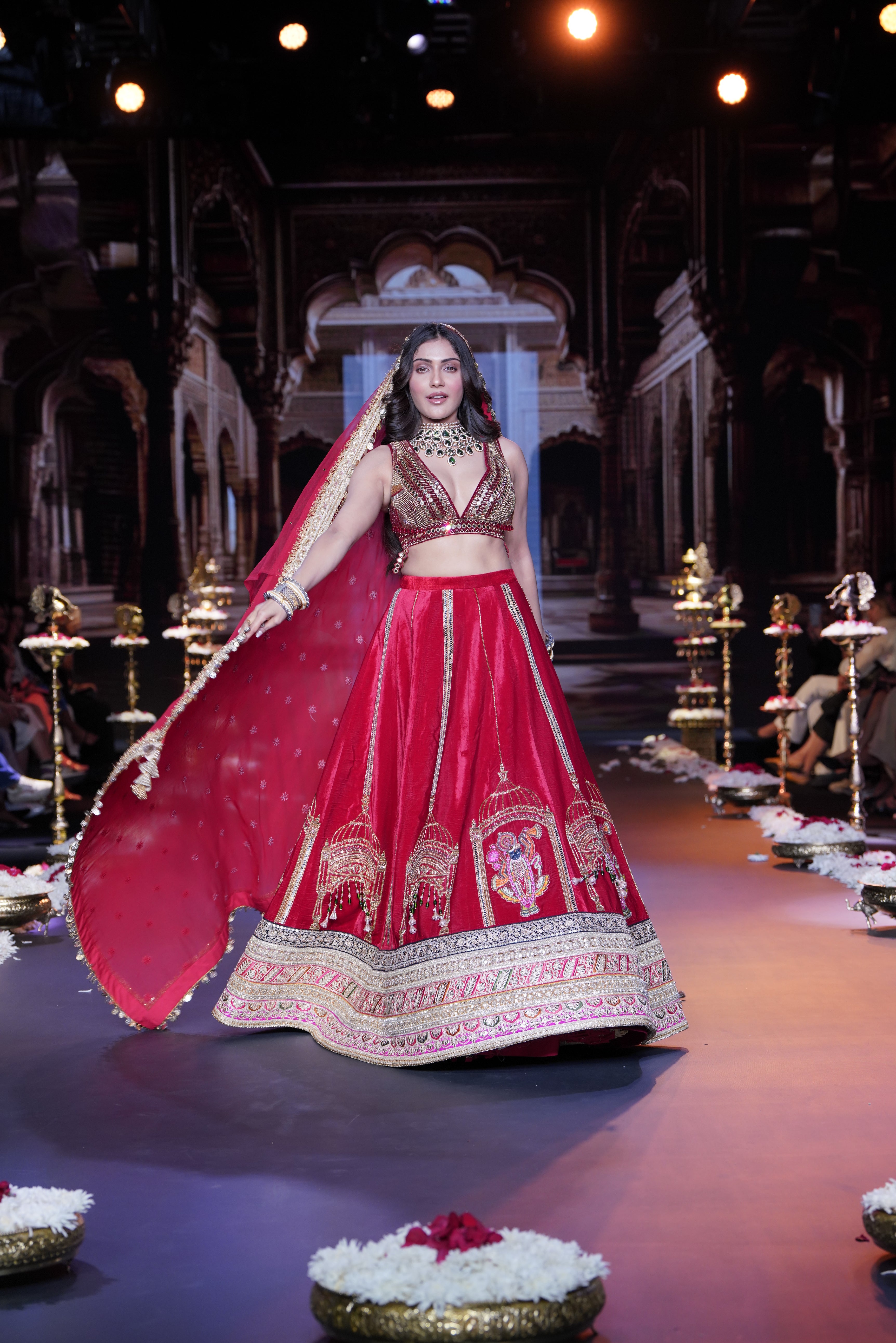 Red embroidered lehenga set with srinathji motif