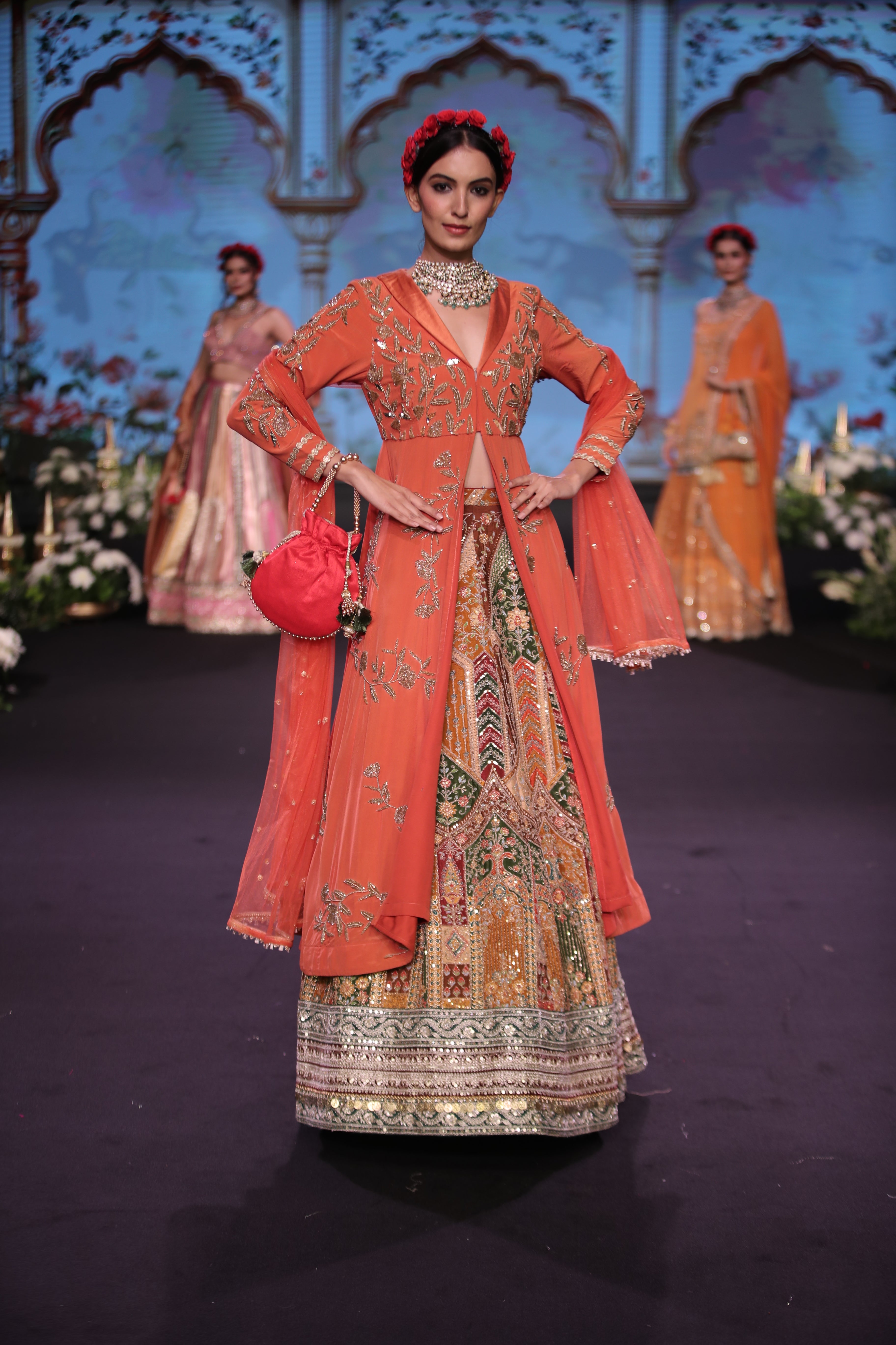 Orange kurta jacket and multi color embroidered lehenga set