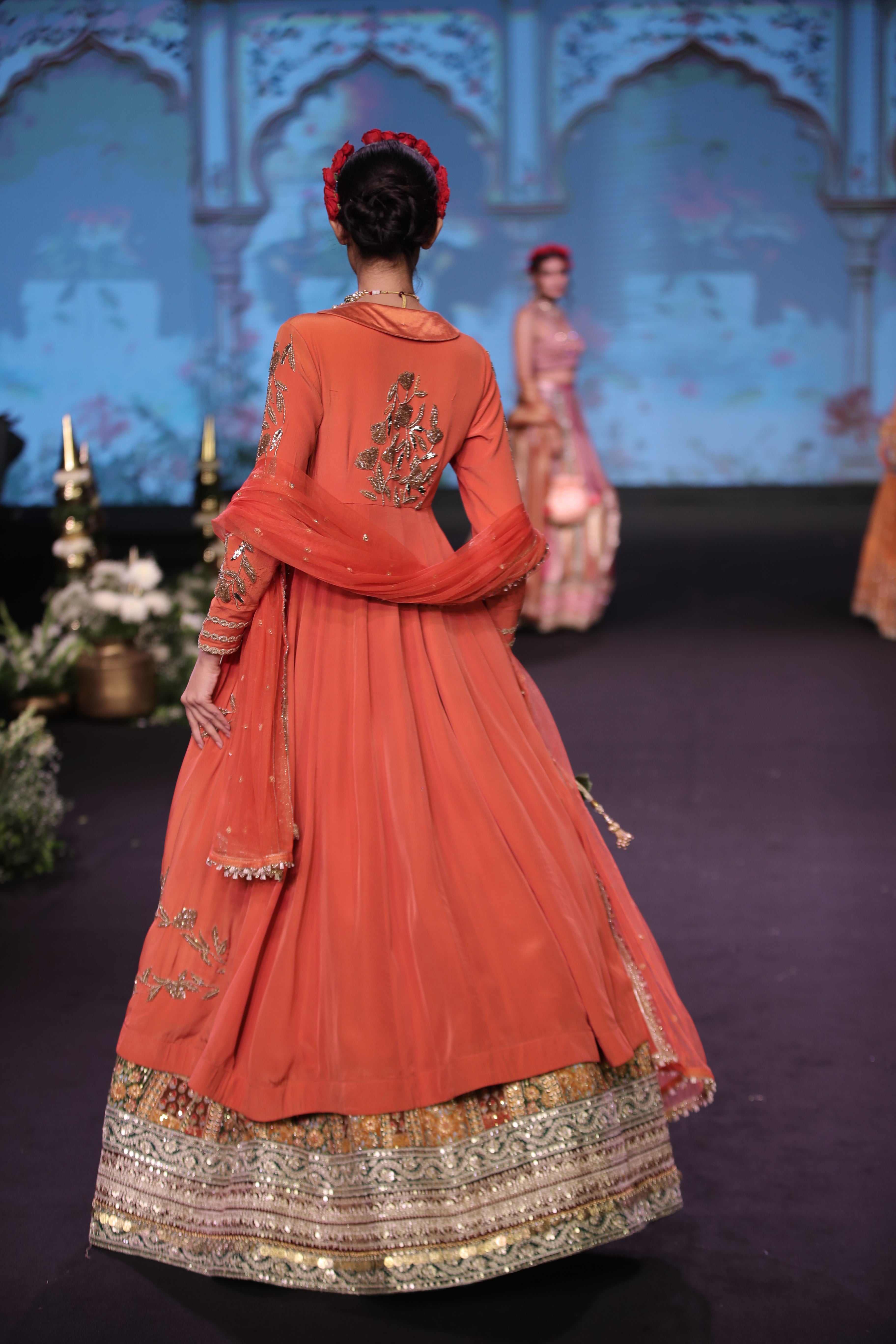 Orange kurta jacket and multi color embroidered lehenga set
