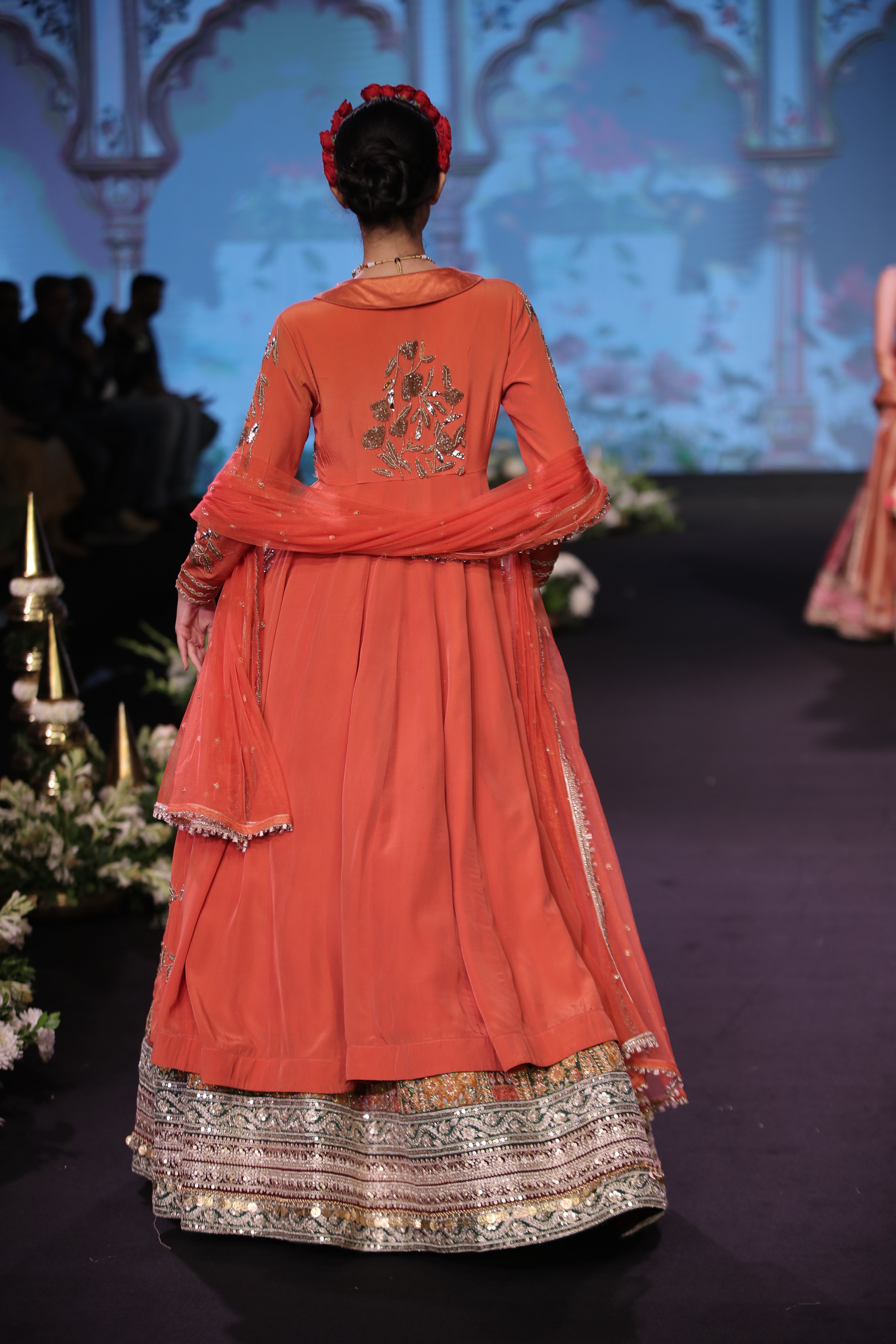 Orange kurta jacket and multi color embroidered lehenga set