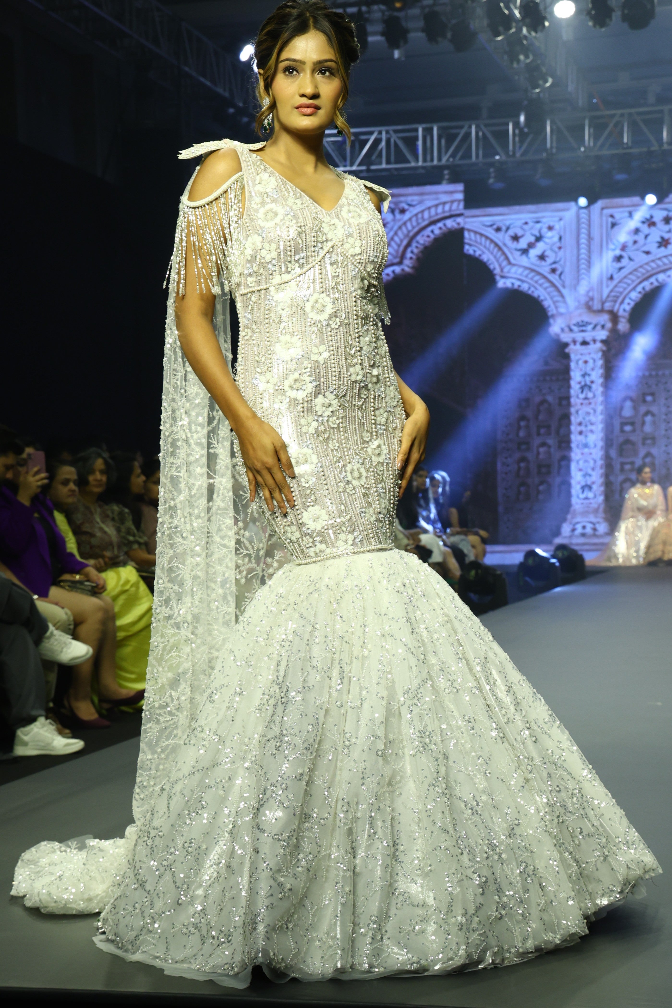 White mermaid cut gown with sequin embroidery