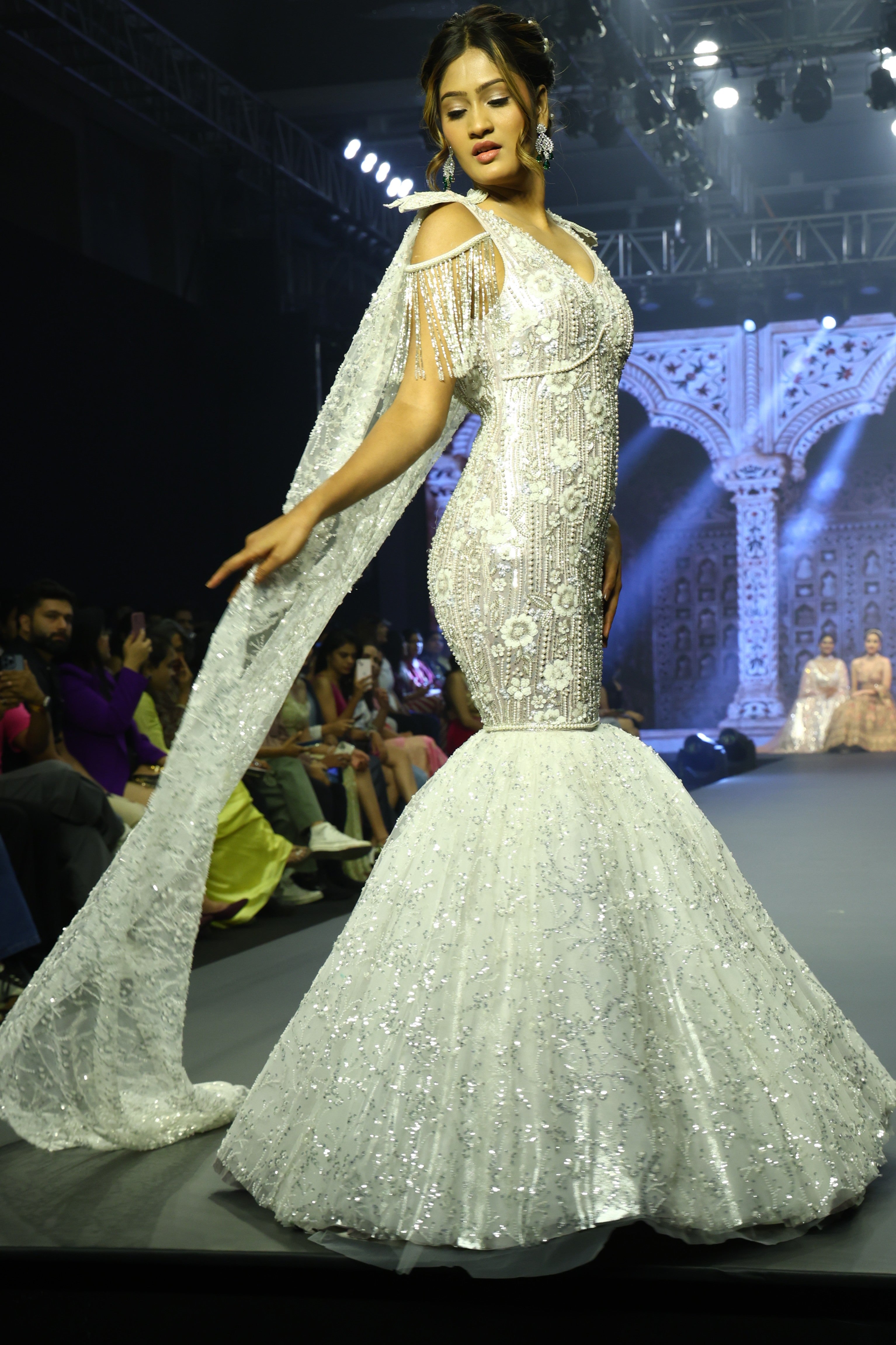 White mermaid cut gown with sequin embroidery