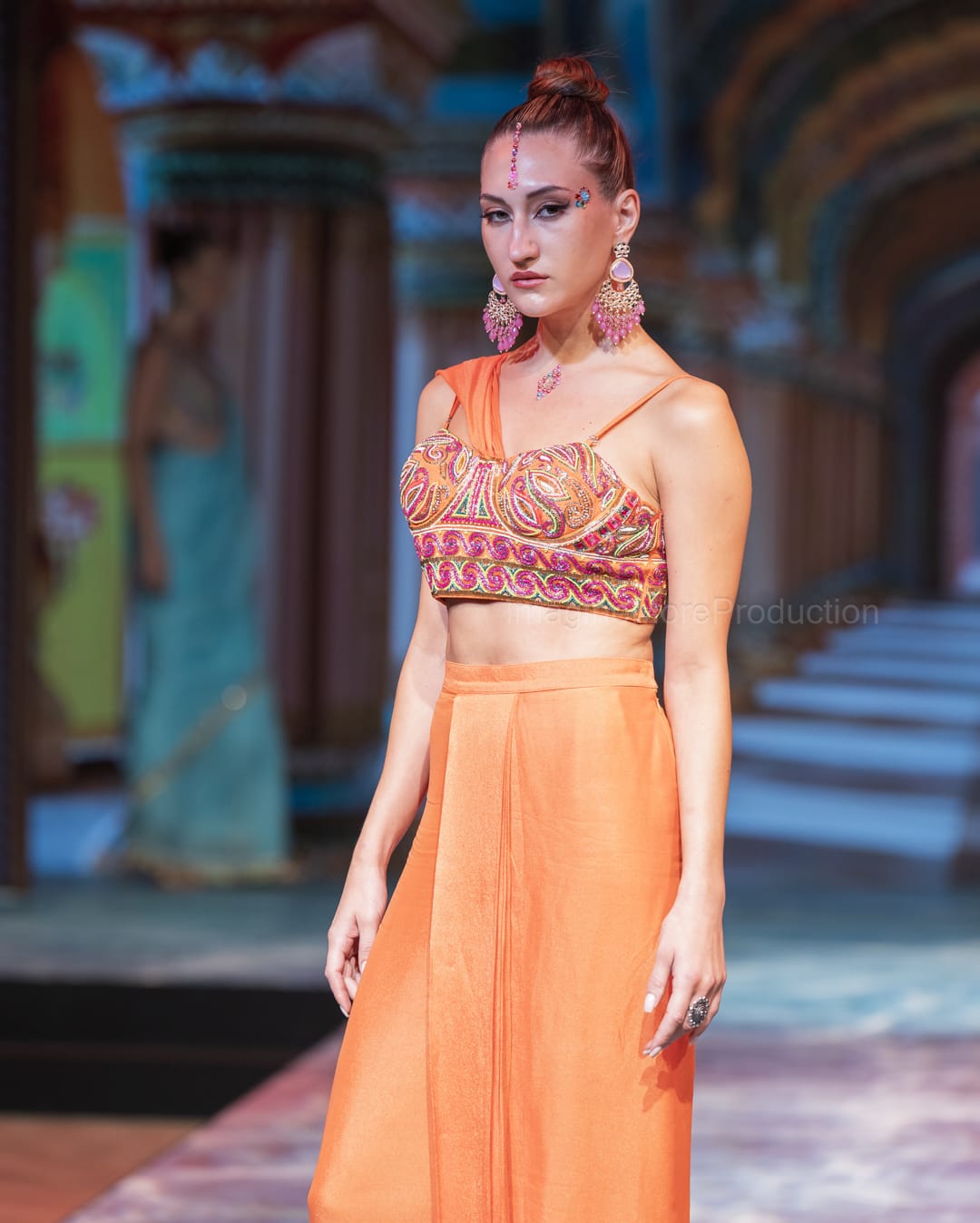 Orange embroidered drape saree
