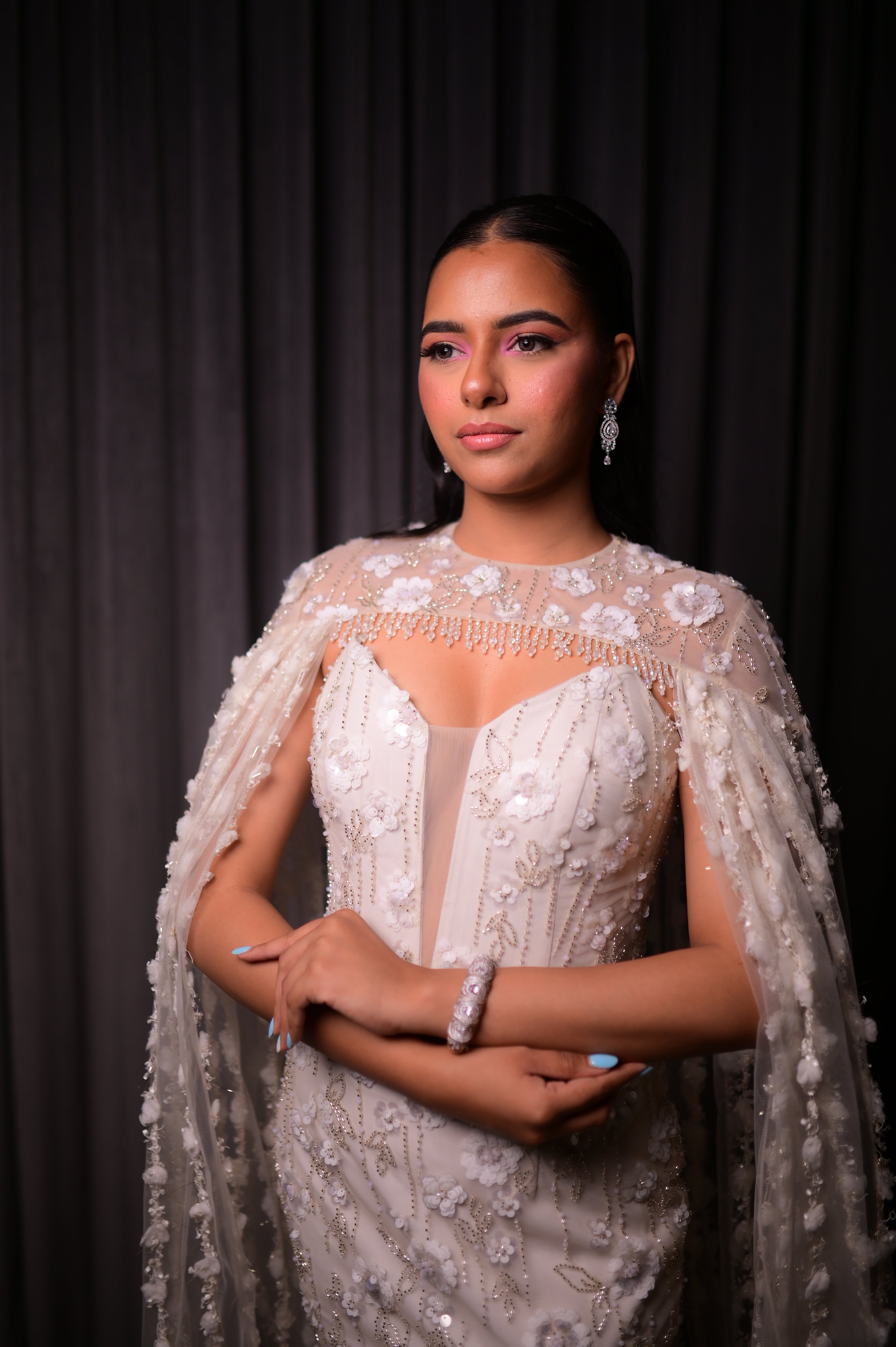 White sequin gown with cape