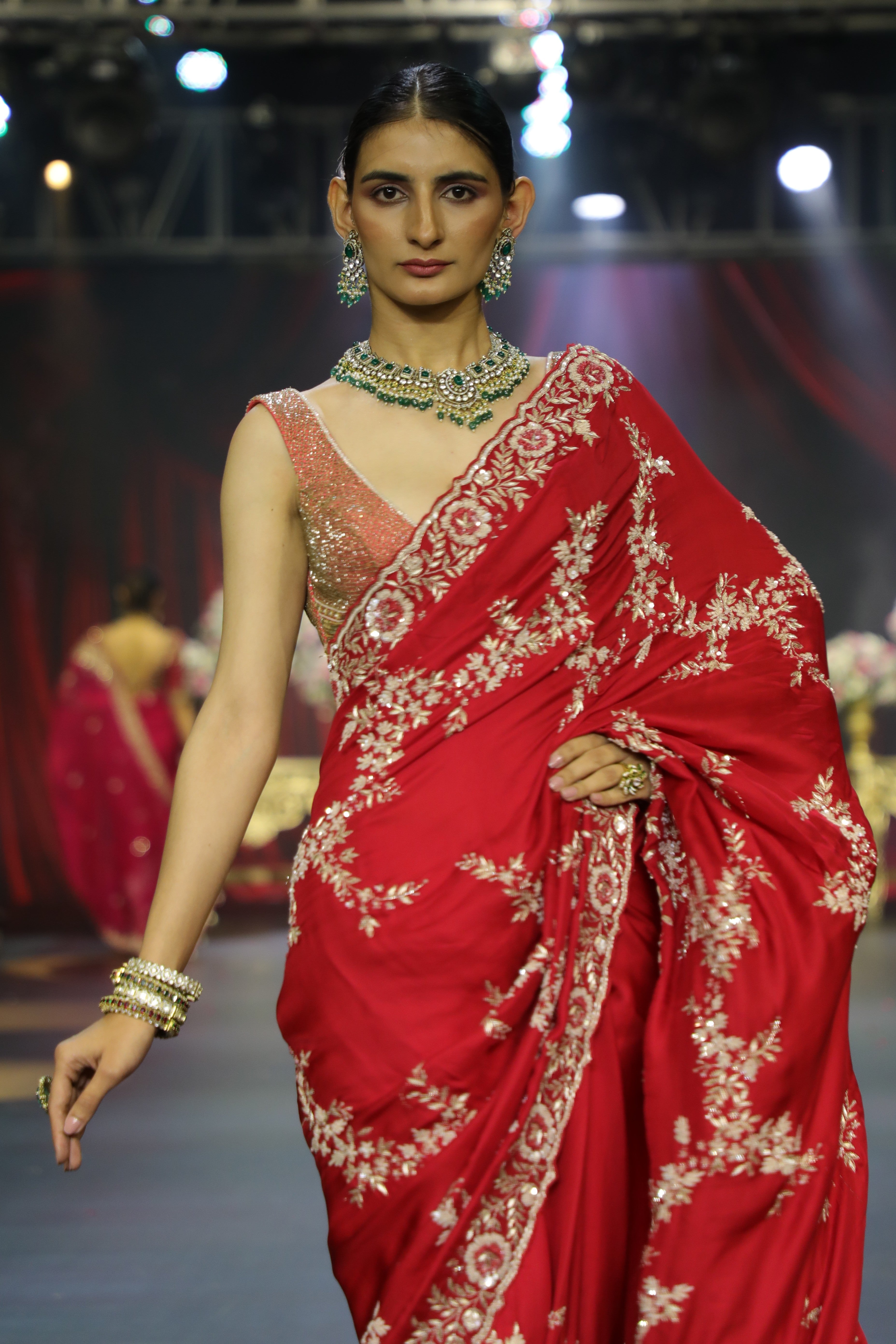 Red zardozi and cutdana work saree