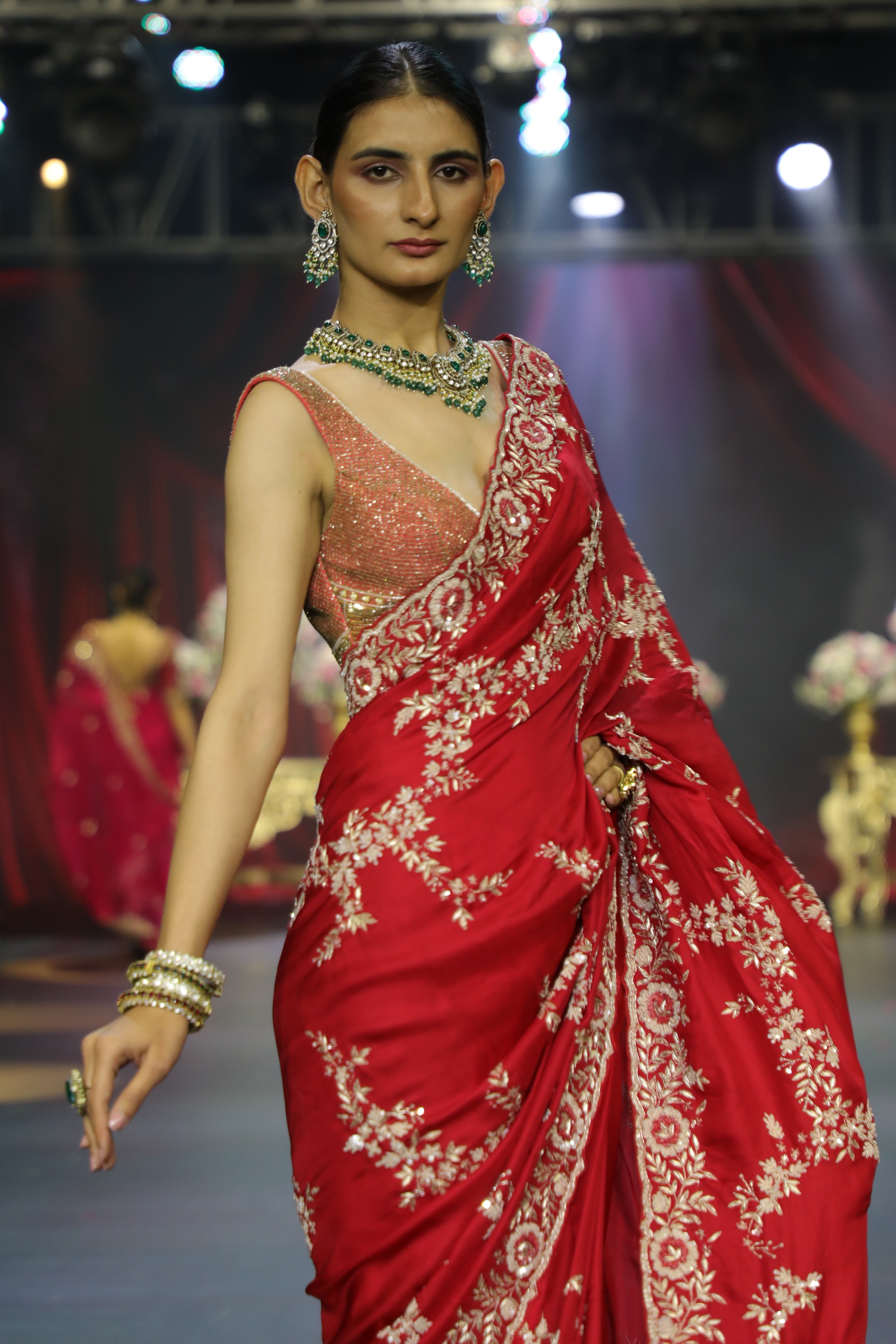 Red zardozi and cutdana work saree