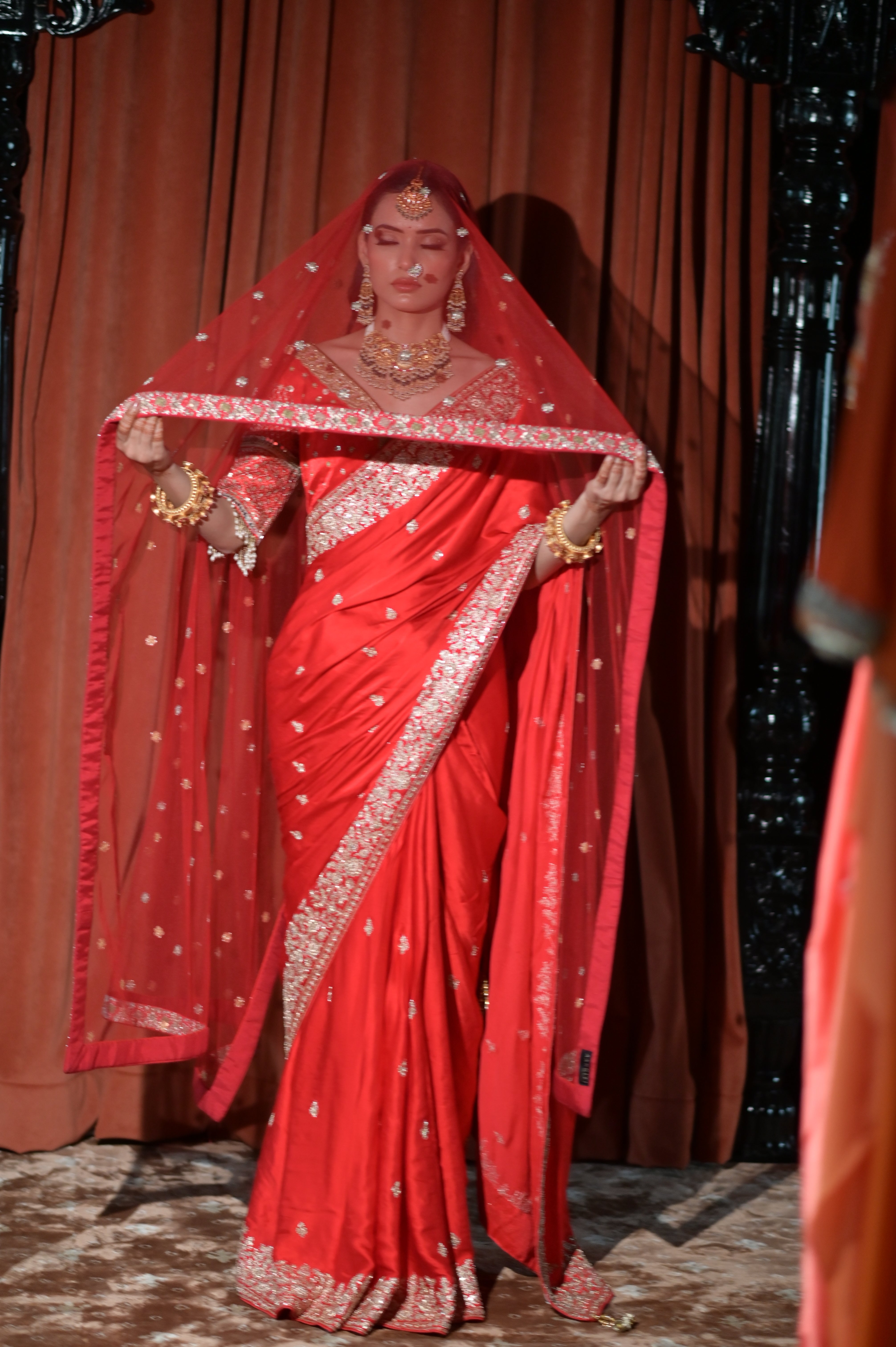 Red embroidered saree