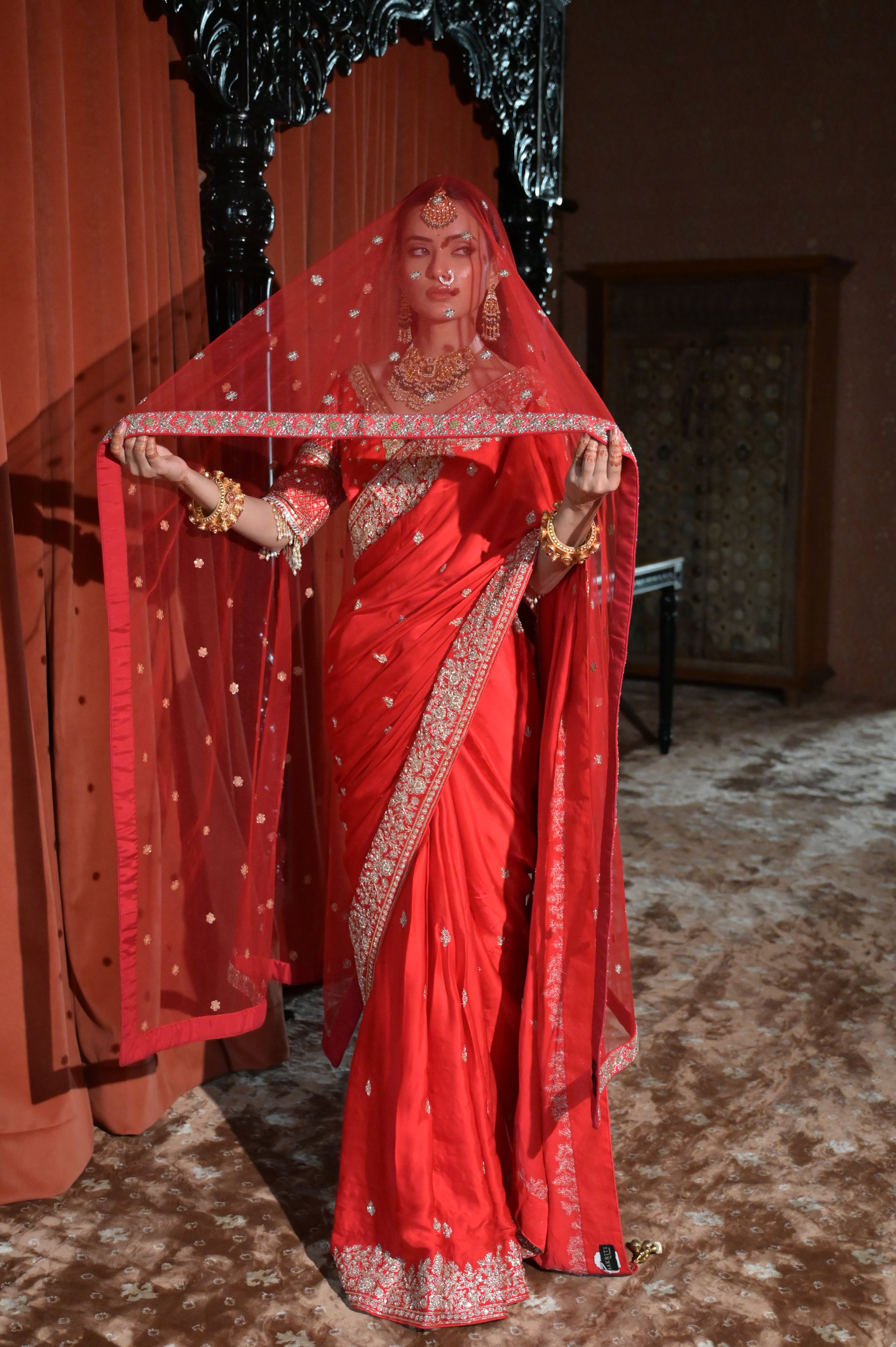Red embroidered saree