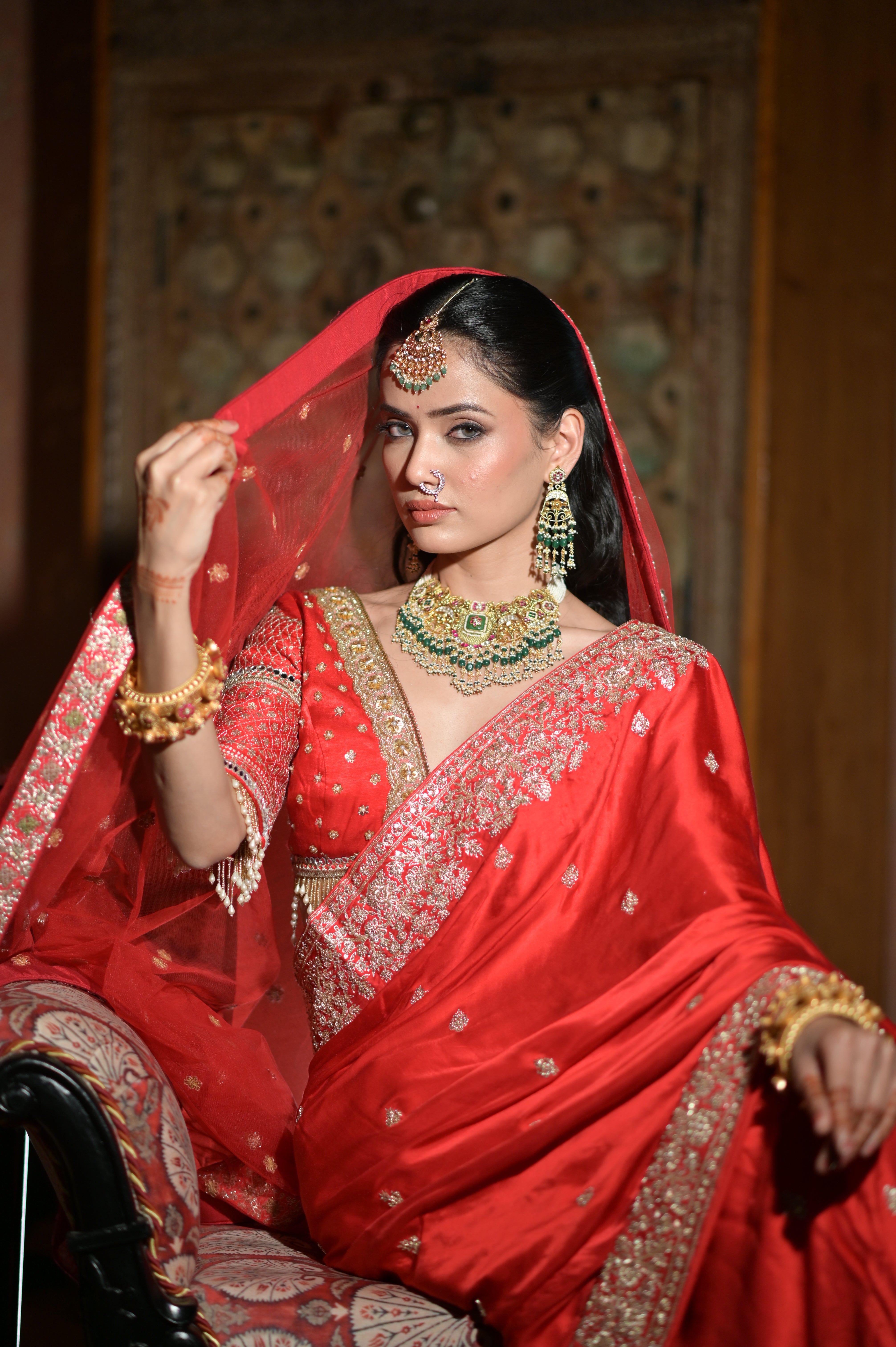 Red embroidered saree