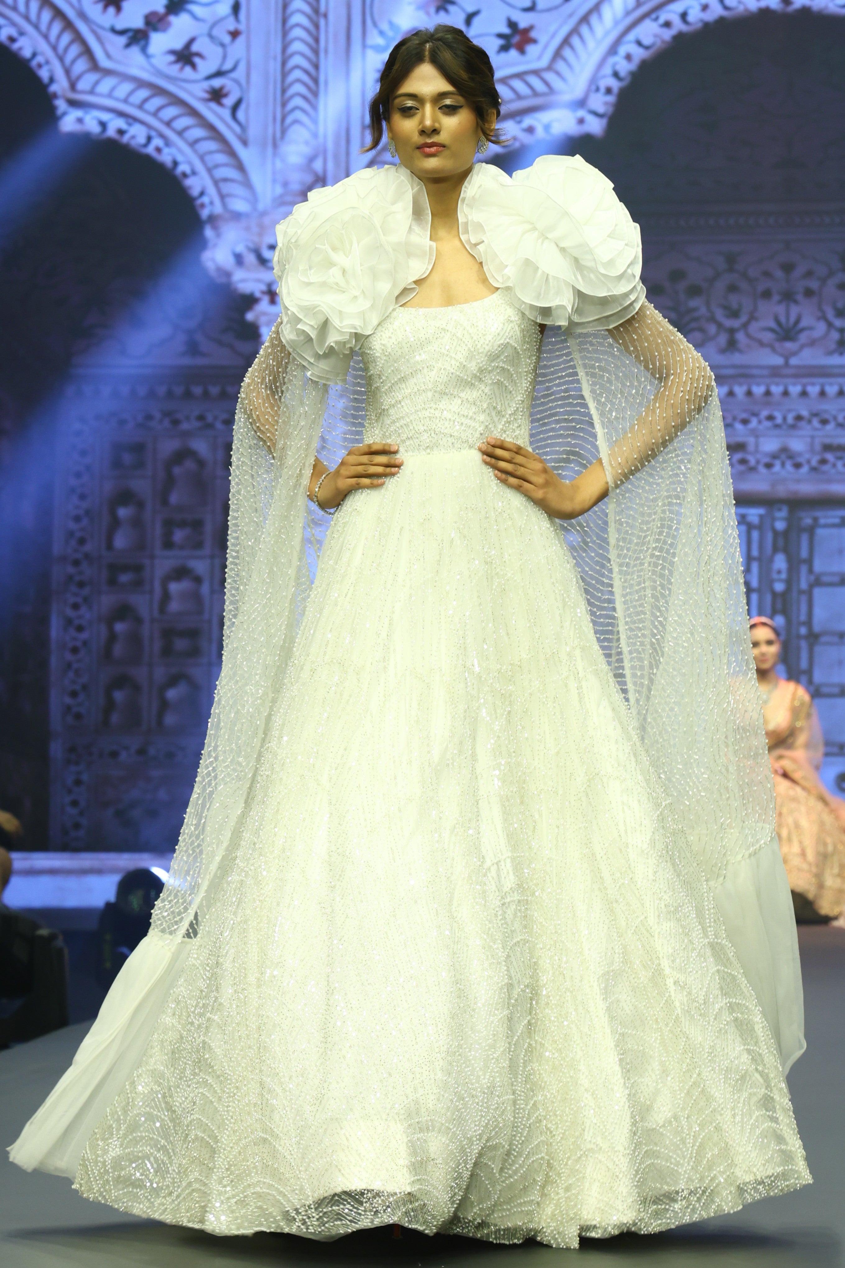 White embroidered gown with cape