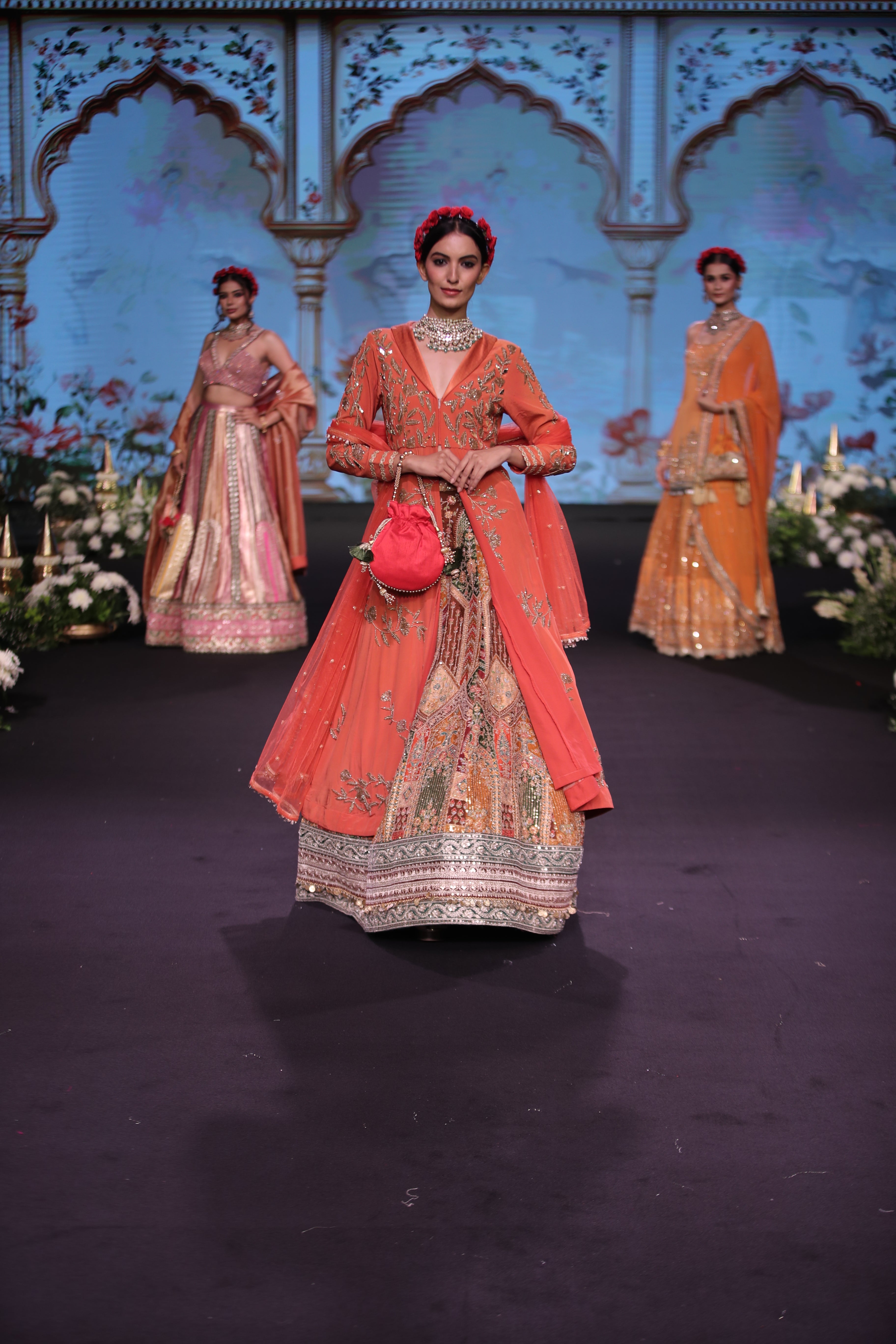 Orange kurta jacket and multi color embroidered lehenga set
