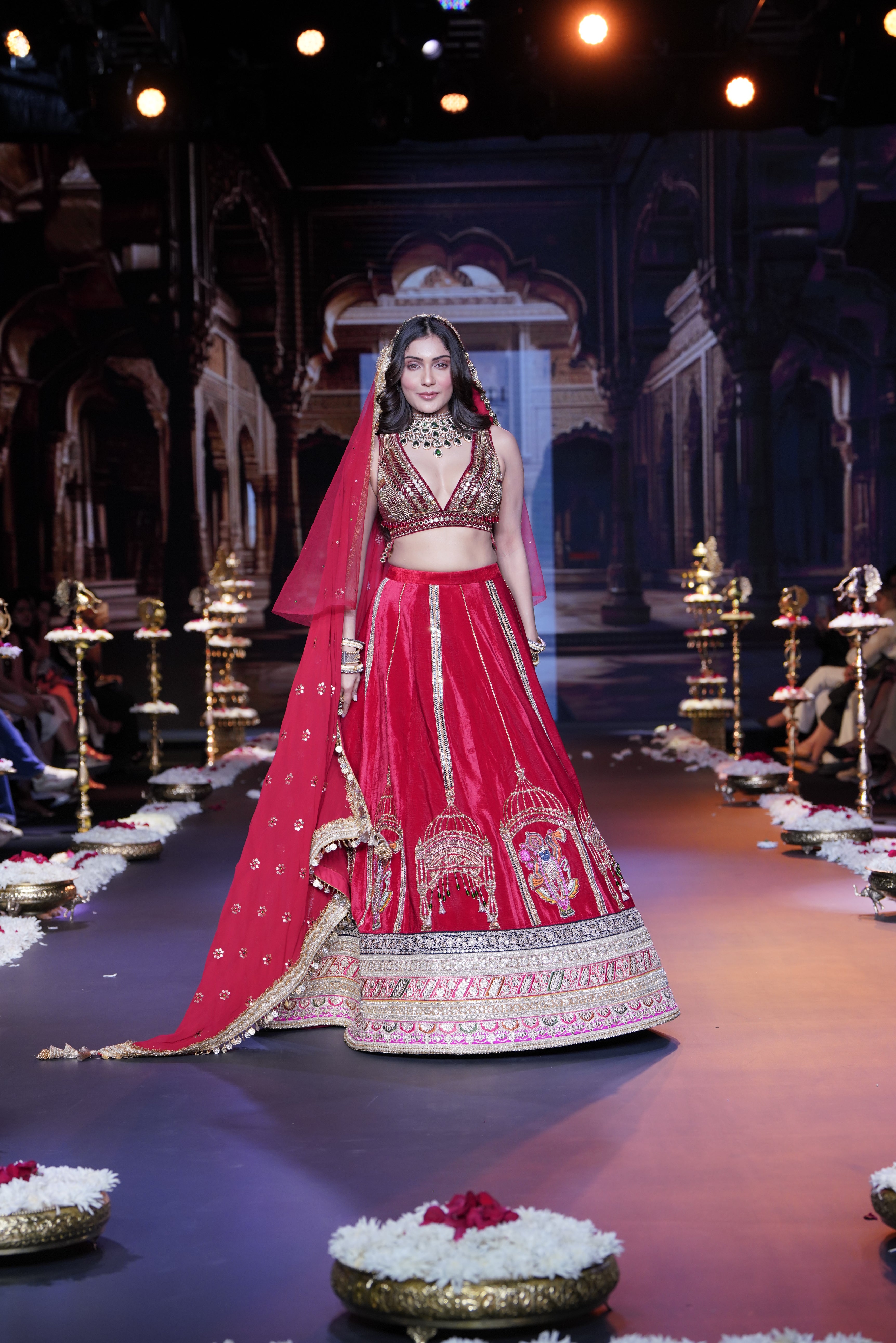 Red embroidered lehenga set with srinathji motif