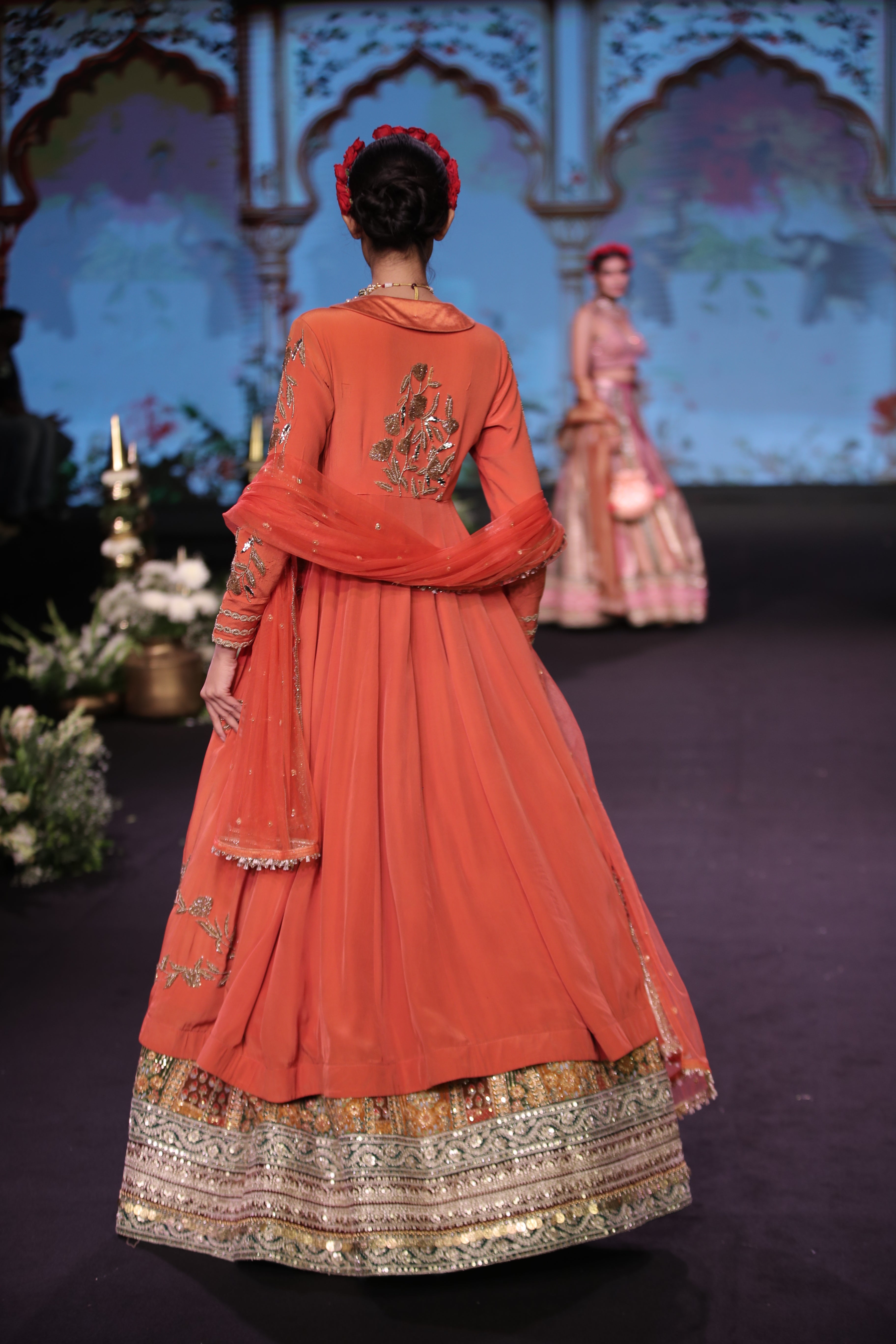 Orange kurta jacket and multi color embroidered lehenga set
