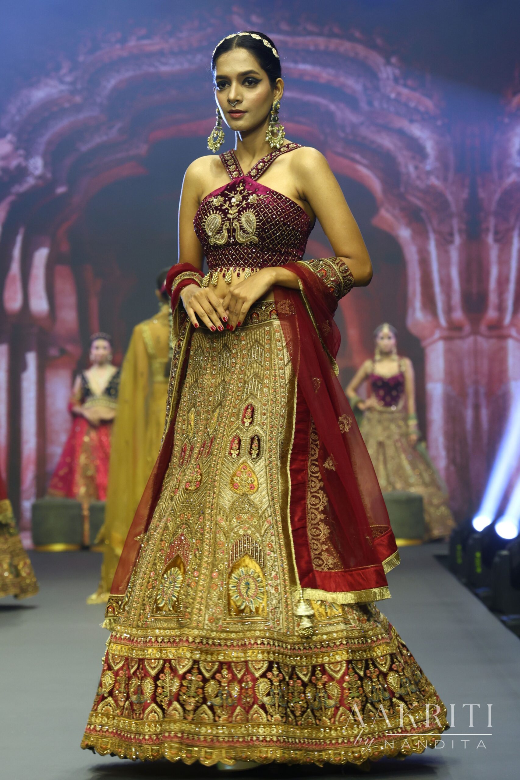 Wine And Golden Lehenga